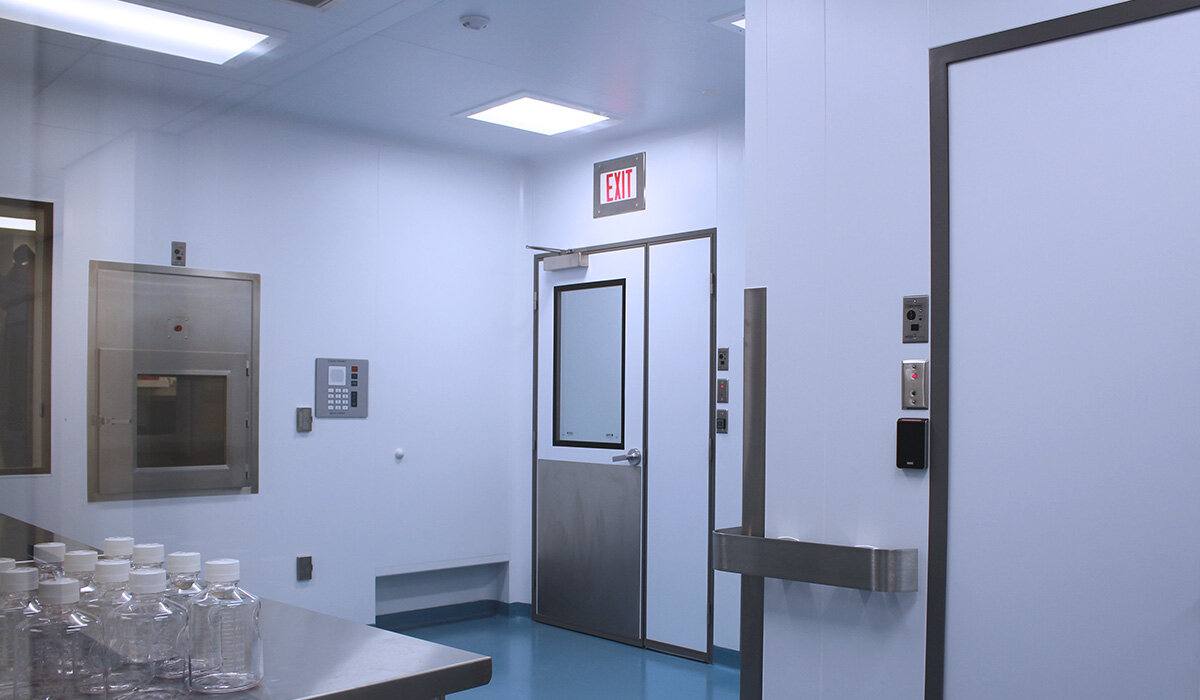 Finished cleanroom pass-through and interlocked doors